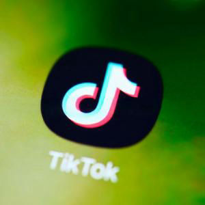 How has TikTok handled dangerous driving content?
